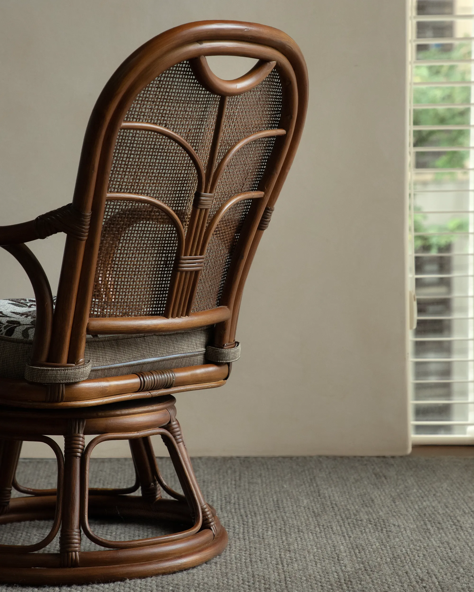 Ray Mini Rattan Swivel Chair