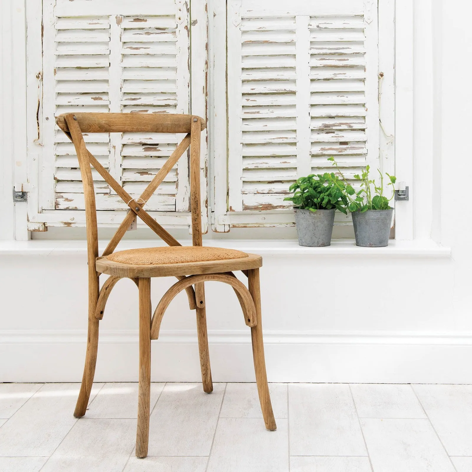 STACKABLE DINING CHAIR WITH PADDED RATTAN SEAT